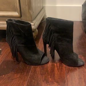 Black dolce vita booties with fringe